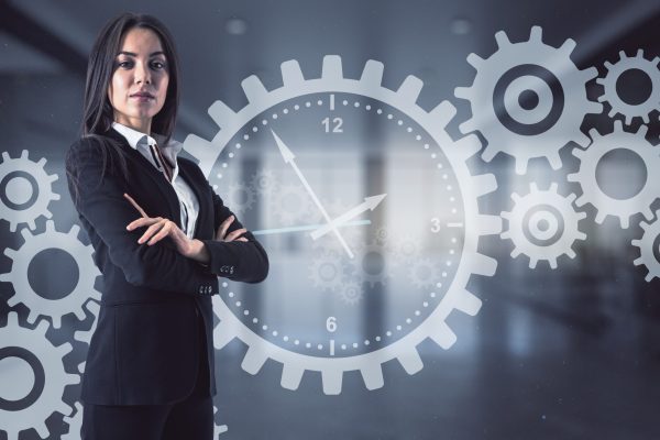 attractive-businesswoman-and-glowing-cogwheel-holo-2026-01-11-08-37-37-utc