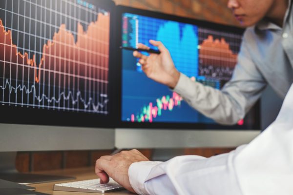 Investment stock market  Entrepreneur Business Team discussing and analysis graph stock market trading,stock chart concept