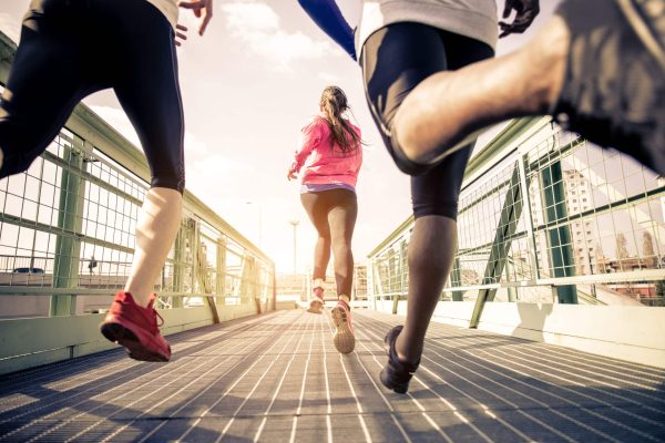 Joggers running outdoors health