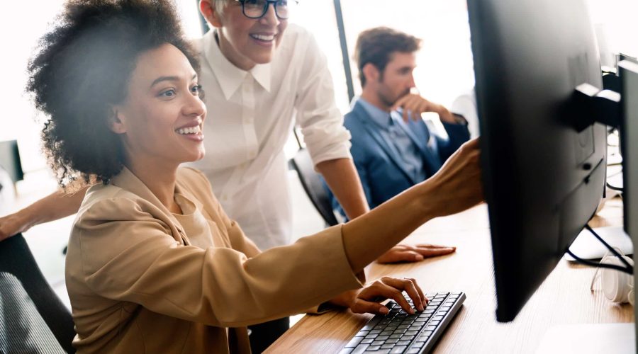 Programmers cooperating at IT company developing apps Strategic Campaign