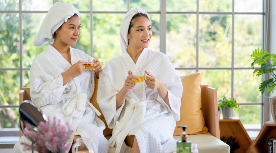 two-asian-pretty-women-hold-cup-of-tea-and-look-to-2026-01-08-22-49-21-utc beauty